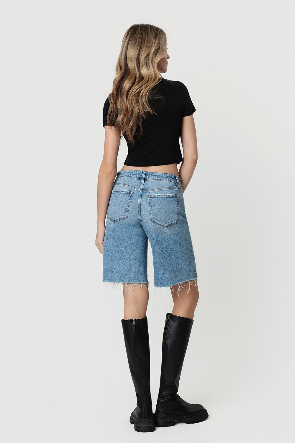 Mid Rise Raw Hem Medium Wash Shorts