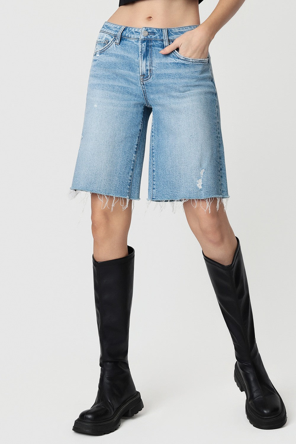 Mid Rise Raw Hem Medium Wash Shorts