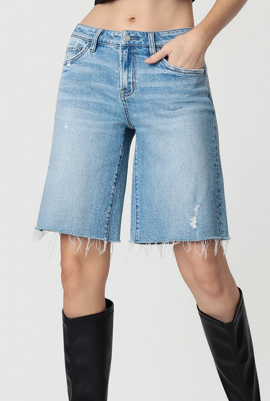 Mid Rise Raw Hem Medium Wash Shorts