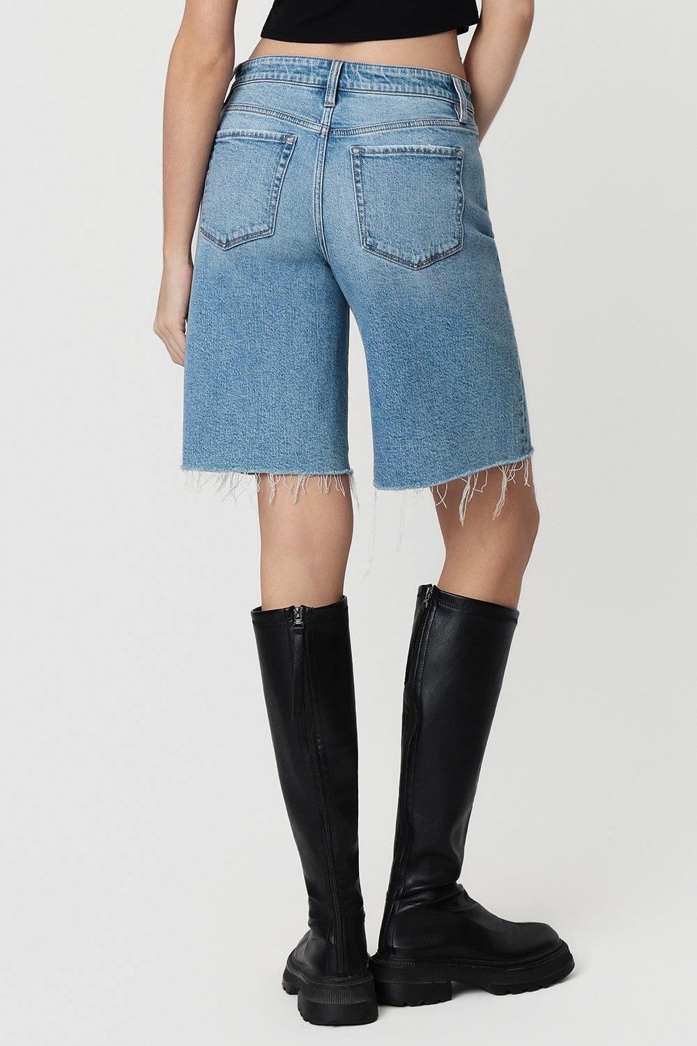 Mid Rise Raw Hem Medium Wash Shorts