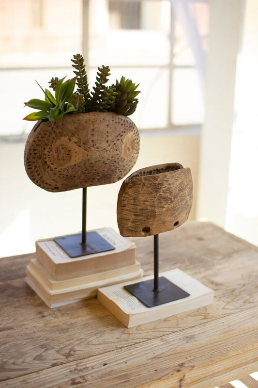 Repurposed Wooden Cow Bell Planters on Iron Stand